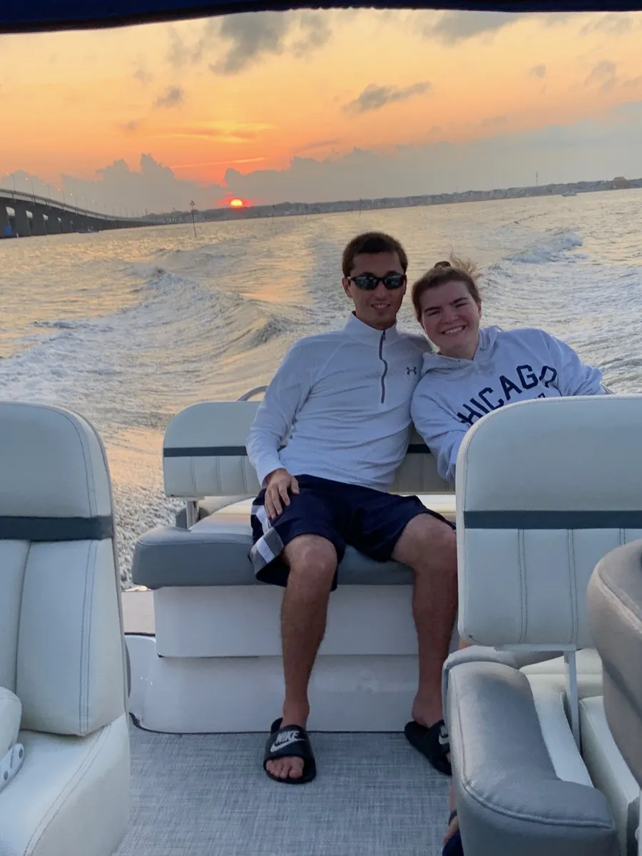 Cliff and Charly boating at sunset on the New Jersey shore